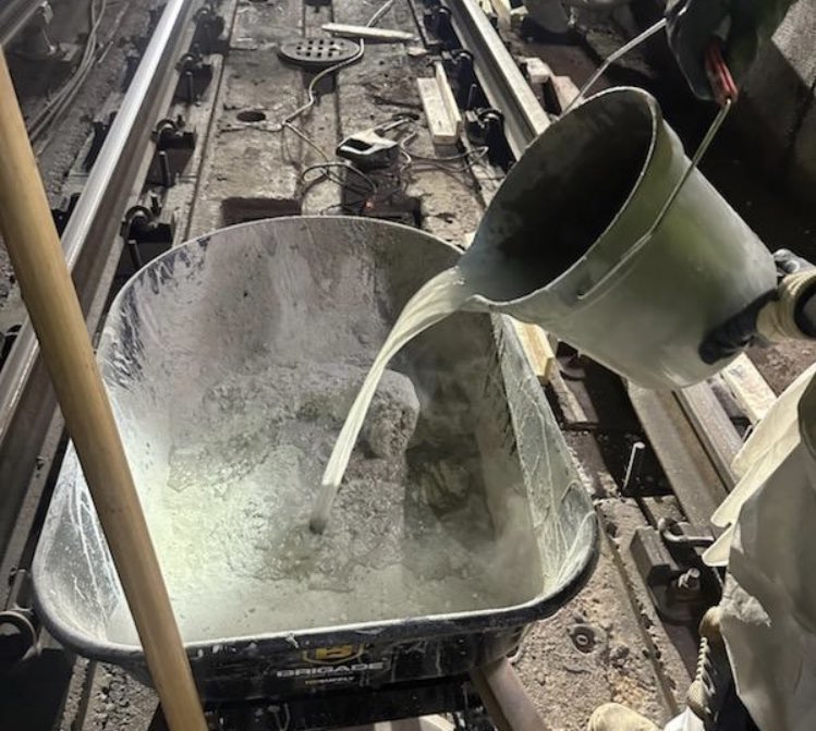 wmata's tweet photo. Over the weekend, #YourMetro team was busy on the Blue &amp; Orange lines:

▶️ Poured concrete for grout pad maintenance.  
▶️ Removed bolts from restraining rails using grinders &amp; torches.

These efforts aim to improve track stability &amp; safety. Thanks for your patience! #wmata https://t.co/DkHuQI4dap