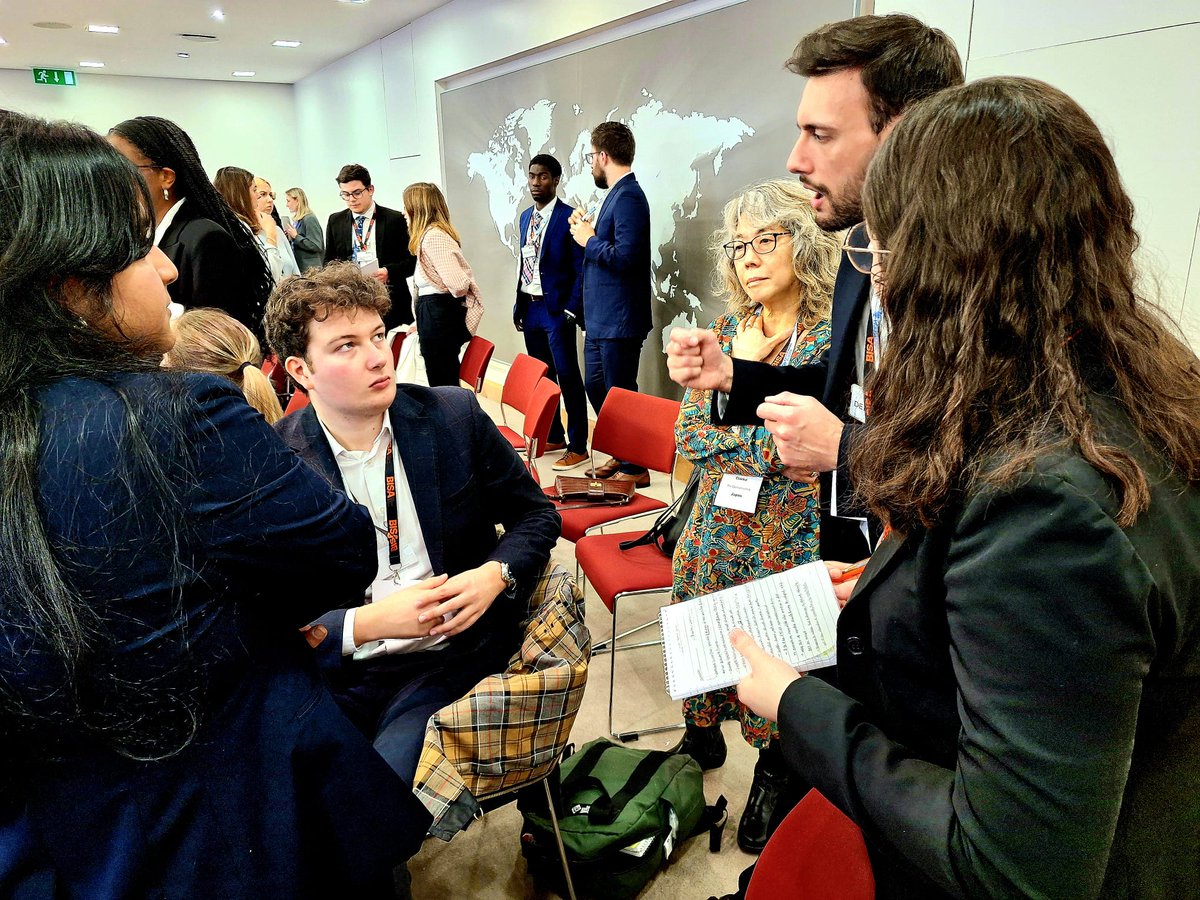 BISA - British International Studies Association (@mybisa) on Twitter photo <a href="/leedsbeckett/">Leeds Beckett</a> <a href="/GoldsmithsPolit/">Goldsmiths Politics</a> <a href="/ChathamHouse/">Chatham House</a> <a href="/soas_cisd/">SOAS Centre for International Studies & Diplomacy</a> <a href="/PIRWestminster/">WestminsterPolitics&InternationalRelations</a> <a href="/LboroIRPH/">Lboro International Relations, Politics & History</a> <a href="/dmuleicester/">dmuleicester</a> <a href="/LSEIRDept/">LSE Intl Relations</a> <a href="/UWEPoliticsIR/">Politics and IR at UWE Bristol</a> <a href="/Aston_PIR/">Aston Politics and International Relations</a> <a href="/leedsbeckettint/">Leeds Beckett International</a> <a href="/IRSussex/">Sussex IR🏳️🌈✊🏽✊🏾✊🏿</a> <a href="/dundeeuni/">University of Dundee</a> <a href="/BathSpaUni/">Bath Spa University</a> <a href="/CH_Environment/">Chatham House Environment and Society</a> #climatesim 2025
Russian delegates (<a href="/Aston_PIR/">Aston Politics and International Relations</a>) have been working hard to build a coalition to pass a climate agreement proposal by Saudi Arabia (<a href="/bournemouthuni/">Bournemouth Uni</a>) & China (<a href="/ChathamHouse/">Chatham House</a>)
As we near the end of the conference, it's clear how difficult it is to achieve consensus! <a href="/leedsbeckett/">Leeds Beckett</a> <a href="/GoldsmithsPolit/">Goldsmiths Politics</a> <a href="/ChathamHouse/">Chatham House</a> <a href="/soas_cisd/">SOAS Centre for International Studies & Diplomacy</a> <a href="/PIRWestminster/">WestminsterPolitics&InternationalRelations</a> <a href="/LboroIRPH/">Lboro International Relations, Politics & History</a> <a href="/dmuleicester/">dmuleicester</a> <a href="/LSEIRDept/">LSE Intl Relations</a> <a href="/UWEPoliticsIR/">Politics and IR at UWE Bristol</a> <a href="/Aston_PIR/">Aston Politics and International Relations</a> <a href="/leedsbeckettint/">Leeds Beckett International</a> <a href="/IRSussex/">Sussex IR🏳️🌈✊🏽✊🏾✊🏿</a> <a href="/dundeeuni/">University of Dundee</a> <a href="/BathSpaUni/">Bath Spa University</a> <a href="/CH_Environment/">Chatham House Environment and Society</a> #climatesim 2025
Russian delegates (<a href="/Aston_PIR/">Aston Politics and International Relations</a>) have been working hard to build a coalition to pass a climate agreement proposal by Saudi Arabia (<a href="/bournemouthuni/">Bournemouth Uni</a>) & China (<a href="/ChathamHouse/">Chatham House</a>)
As we near the end of the conference, it's clear how difficult it is to achieve consensus!