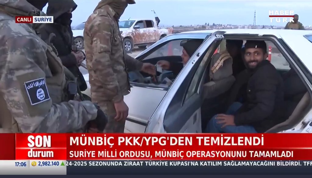 ScharoBajalan's tweet photo. Turkish state TV broadcasting live on the road between Arima and Manbij 

ISIS fighters are among the ranks of the Turkish led SNA. https://t.co/Bl0YK3gn3m