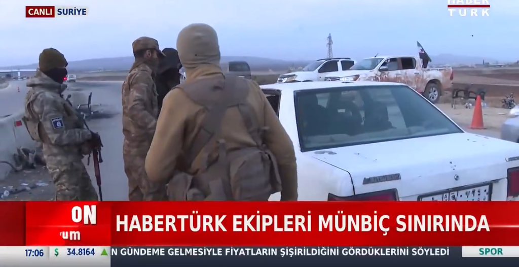 ScharoBajalan's tweet photo. Turkish state TV broadcasting live on the road between Arima and Manbij 

ISIS fighters are among the ranks of the Turkish led SNA. https://t.co/Bl0YK3gn3m