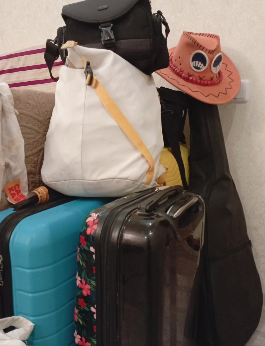irlDemiurge's tweet photo. I’m on the move again, but not too far (same city) and not alone. there’s another big suitcase (also yellow, haha) and a couple of backpacks with tech and cables missing from the photo. new place tomorrow (uwu) https://t.co/HQ2lFFIXSA