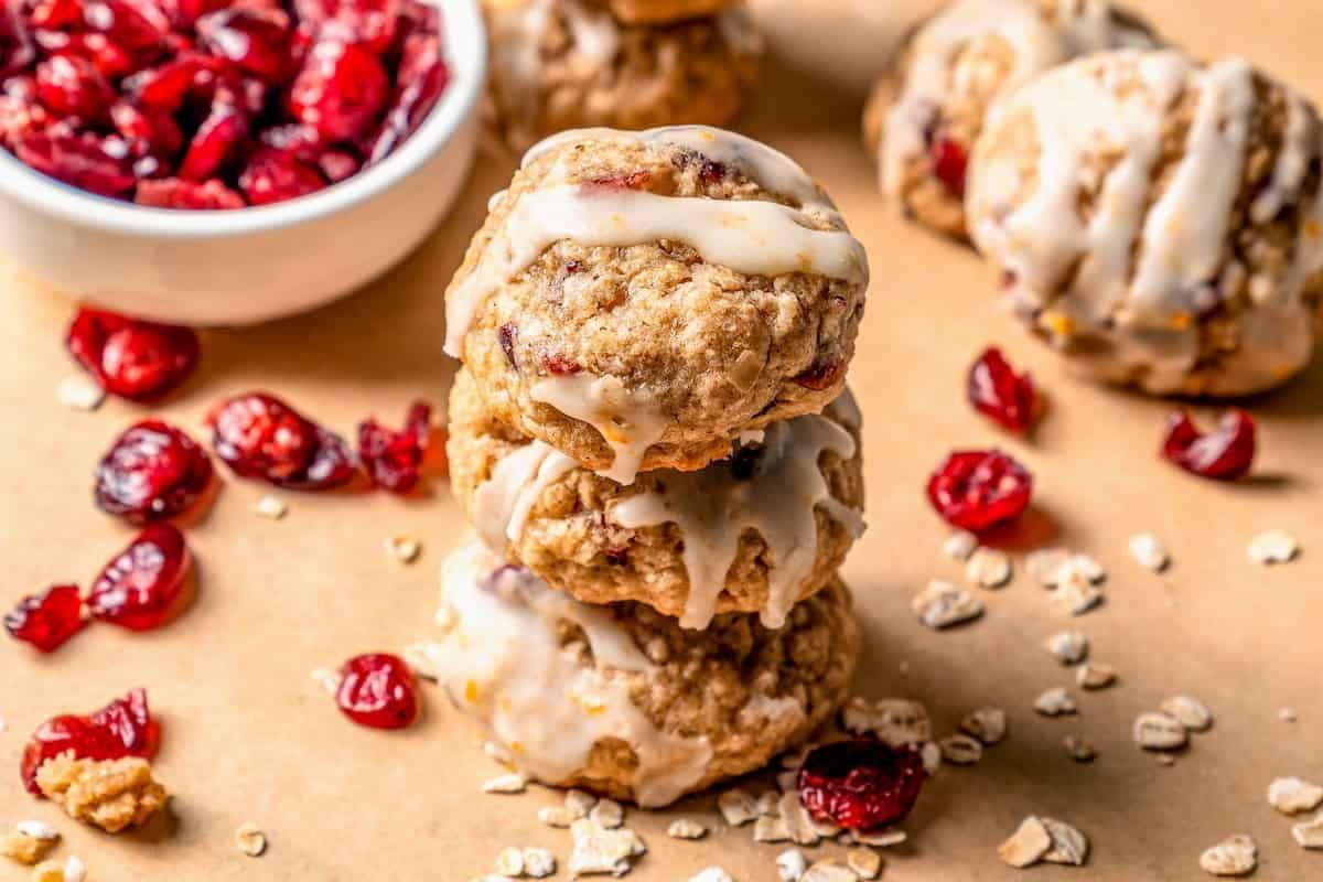 {NEW} Cranberry Oatmeal Cookies are soft and chewy, studded with dried cranberries and drizzled with a delicious citrus glaze. familyfoodonthetable.com/cranberry-oatm… #cookies #christmascookies #holidays