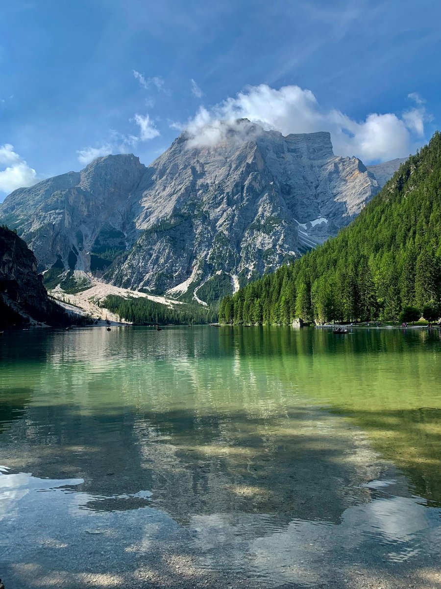 Beneath the sky, so vast and blue,
Nature hums its timeless tune.
The whispering leaves, the dancing streams,
Paint a world beyond our dreams.

Mountains stand with quiet grace,
Rivers carve their ageless trace.
In every bloom, in every tree,
Nature breathes eternity.