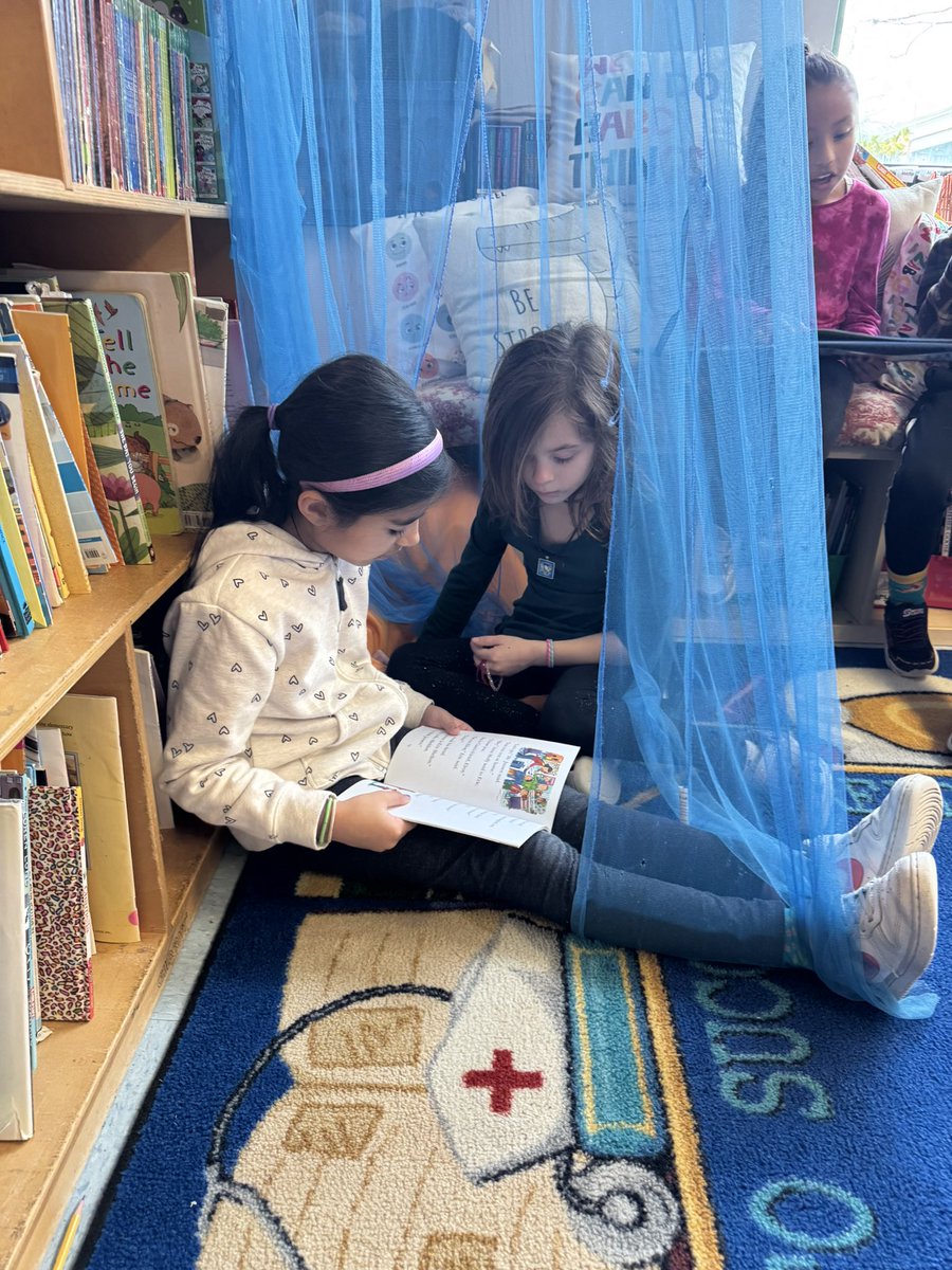 Buddy reading with our first grade friends!