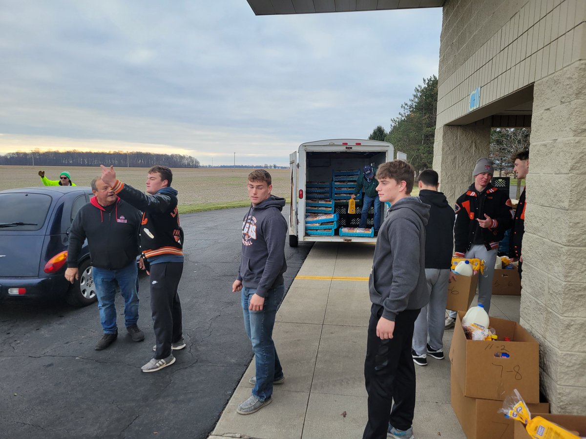 LC_Tigers's tweet photo. After competing for a state title last week, our Liberty Center senior football players helped distribute Christmas Cheer packages for families in the community on Monday. Congratulations on an amazing season seniors! #PositivelyLC https://t.co/qpLihyGRyl