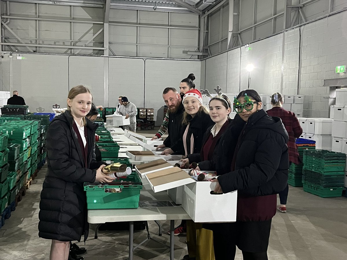 BSGDCharity's tweet photo. Students &amp; staff @BoltonSch have been packing Christmas hampers @UrbanOutreachUK 🎁 Thanks to 7,000+ cans donated by our community, we’re helping prepare 2,000 family boxes &amp; 1,000 bags for singles. Vital support for those struggling this Christmas ❤️ #BoltonGiving https://t.co/mG883ustLd