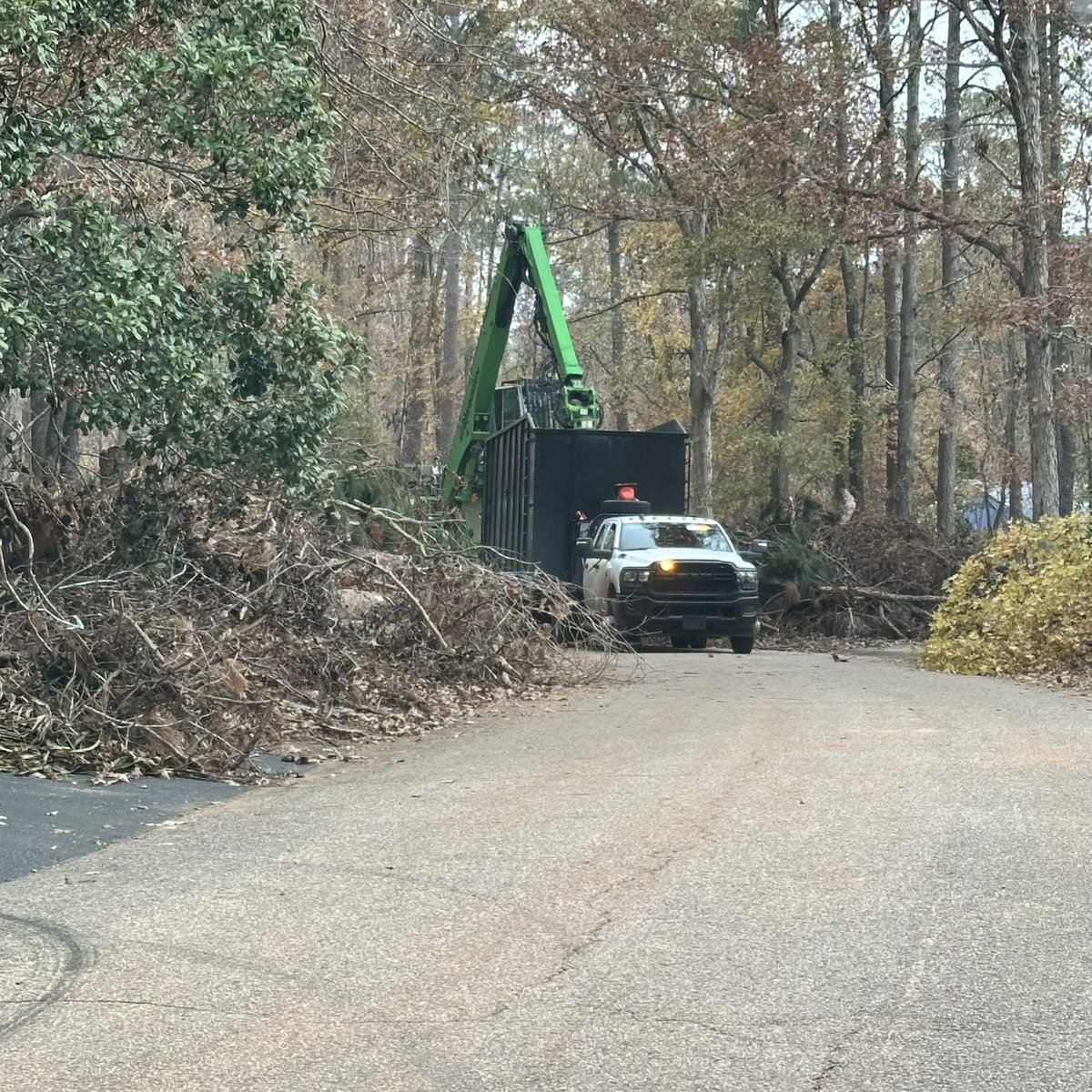 We finally are having the debris removed #HurricaneHelene 2 guys lean on cars all day watching the equipment guys . Equipment guys working hard all day removing debris 🪵🪵watching guys can’t even see equipments guys from where they are parking 🤦‍♀️Wasteful govt 💸<a href="/Elon/">Elon</a> <a href="/DOGE/">Department of Government Efficiency</a>