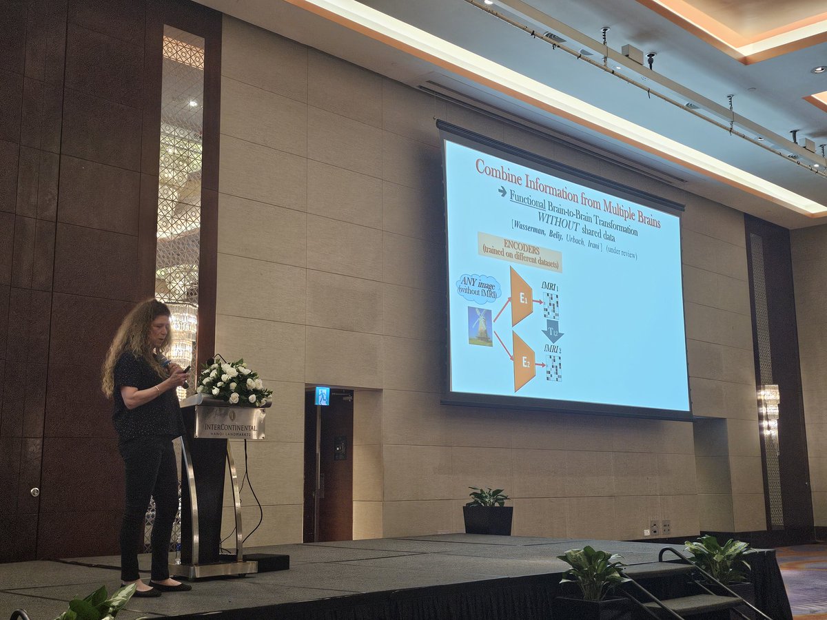 dutran's tweet image. prof. Michal Irani is giving a keynote about &quot;Reading Minds and Machines&quot;