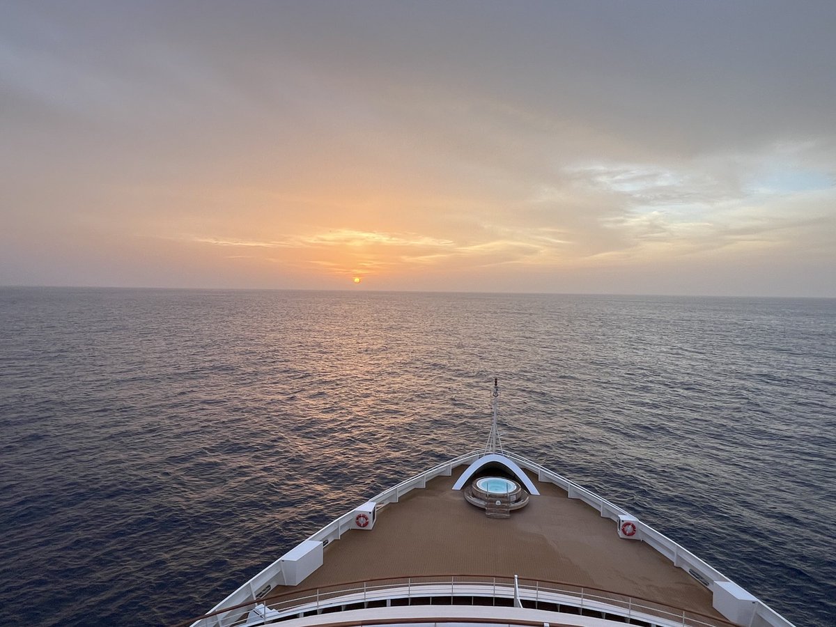 davegamblejr's tweet photo. Last night’s sunset over the port of Praia, Ilha de Santiago, Cape Verde.  This morning’s sunrise over the Atlantic Ocean sailing toward the west coast of Africa, Ivory Coast.  Haze is courtesy of the Sahara dust.  ⁦@spann⁩ https://t.co/8lUmYWjJTA