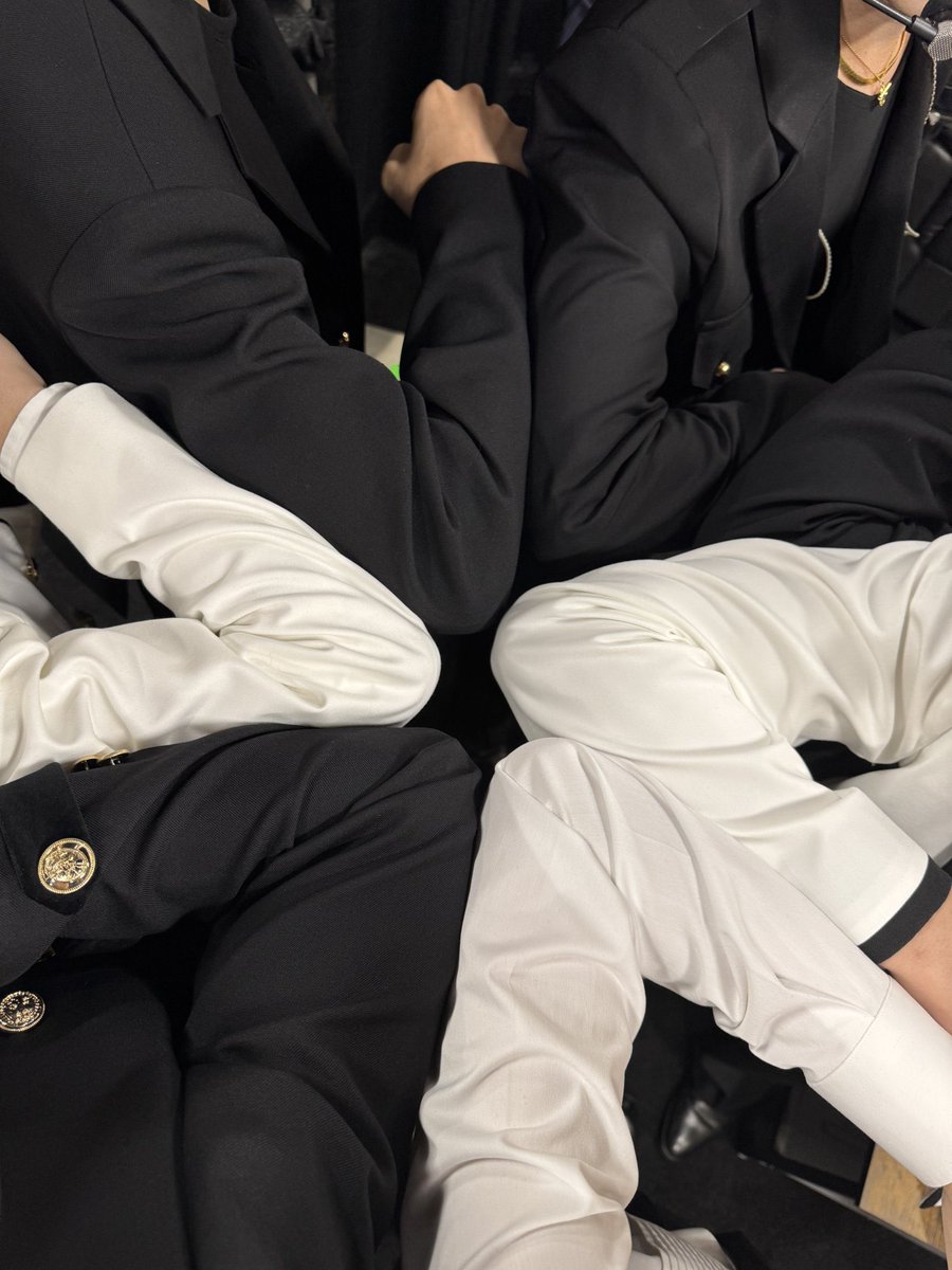 najaemqn's tweet photo. On our second day at Jingle Ball, we were feeling all kinds of magical in our black and white suits. I can’t believe we’re standing here in front of the Allstate Arena, all polished and ready to shine, matching the cool vibe of the city and the perfect lighting of the moment. https://t.co/G9jfjZx9NE