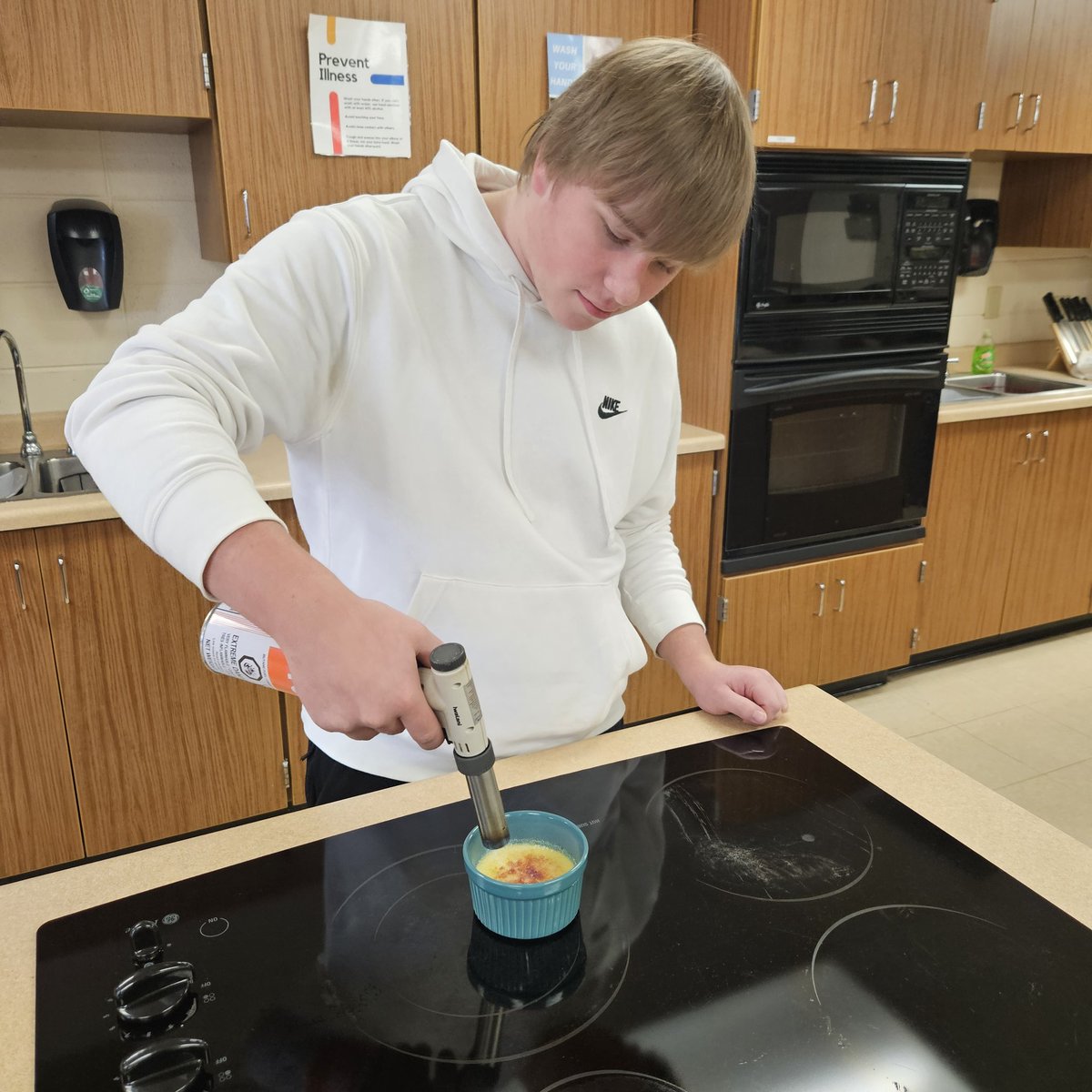 coach_jacobson's tweet photo. The Baking classes started a unit learning about different Creams and Custards. Last week they made Crème Brûlée, and a bonus mini lab and made Chocolate Pudding. This week they make Chocolate Éclairs! #CremeBrulee @wilmotuhs https://t.co/gbNBDBRLjM