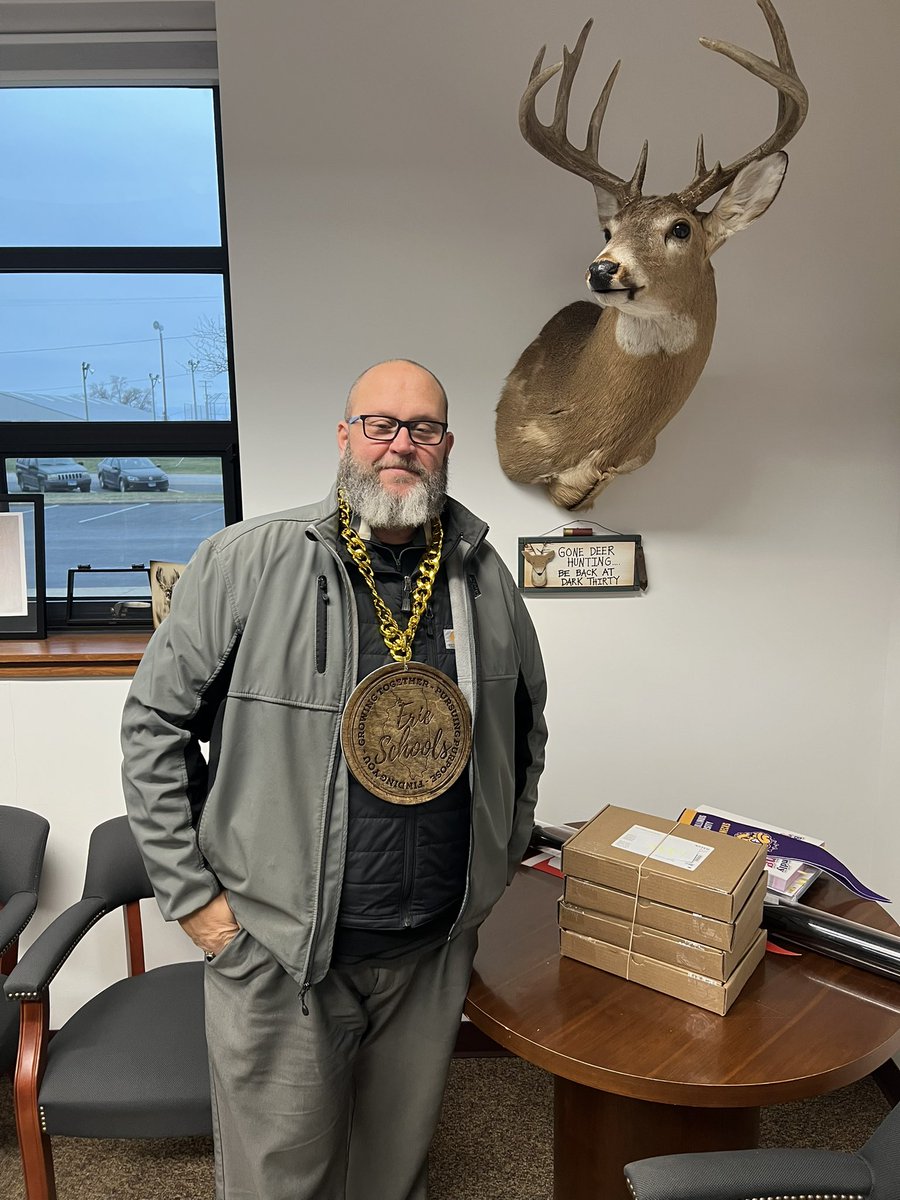 EHSleadgreen's tweet photo. Congrats to Principal @coondog18 McConnell for having the staff Culture Chain passed on to him from Mr Rickels. https://t.co/2EBEnCUJYg