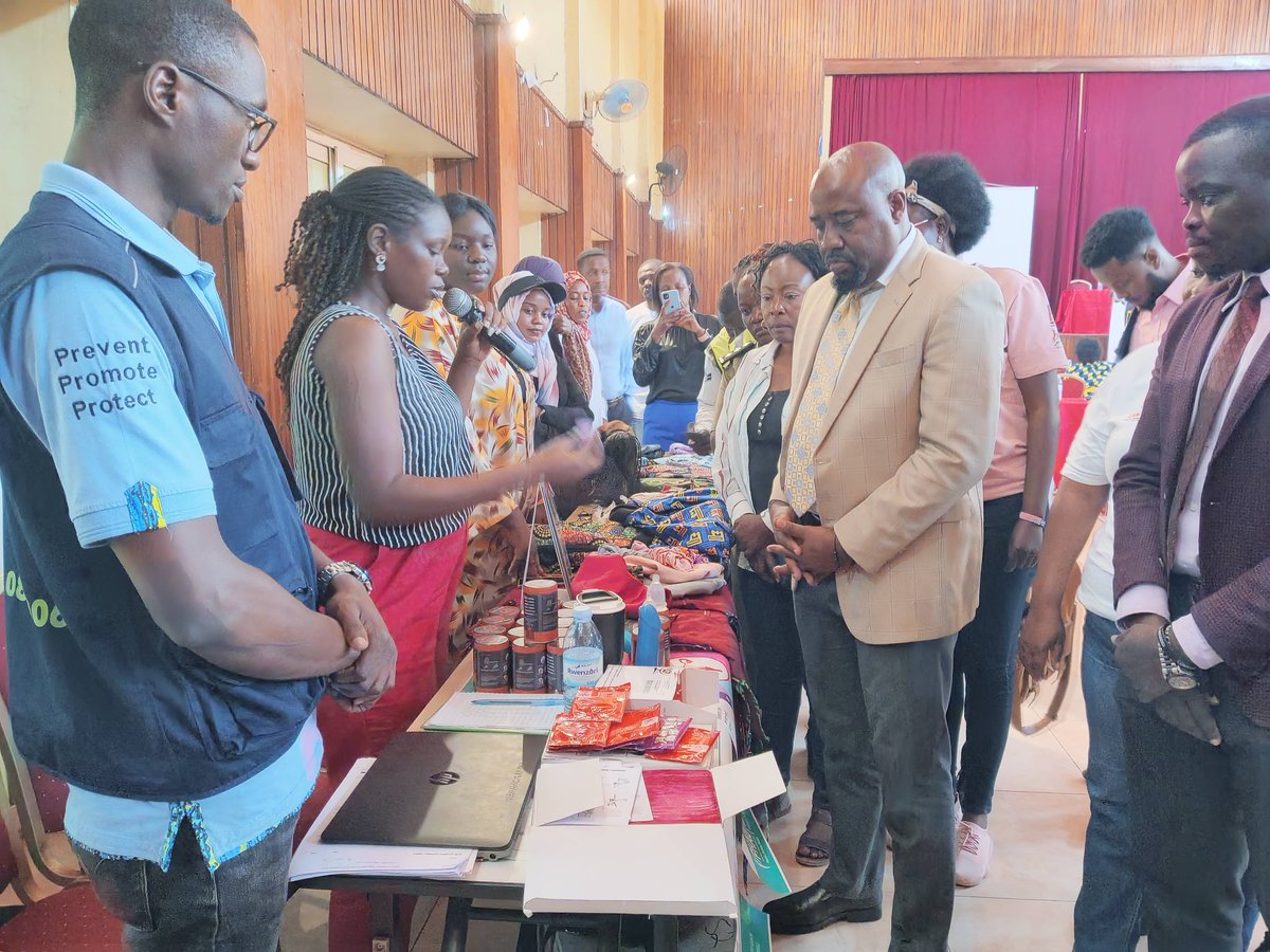 phauganda's tweet photo. The Guest Of Honour at the commemoration of #humanrightsday by @AWYAD21 advocacy meeting Mr Mujuni Benard at the PHAU exhibition table appreciating the work PHAU has done in addressing gender inequality by promoting empowerment of vulnerable girls &amp; women in refugee settlements. https://t.co/fsN6UsZVqd