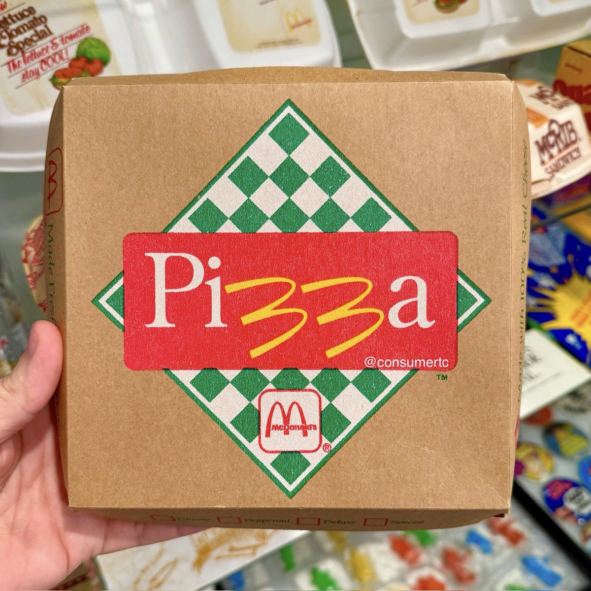 consumertc's tweet photo. Here’s an original McDonald’s individual-sized pizza box from 1992. This is the Canadian version with the sideways arches used as the Zs. https://t.co/QA5AyBhl0y