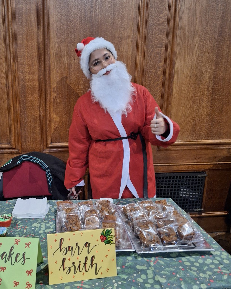 Is that Santa selling Bara Brith at last week's Student Christmas Market? 😱

No! It's Saman, one of our fabulous Medical Sciences students getting into the Christmas spirit! 🧑‍🎄

Saman is also a student ambassador and helps us at our Open Days, so she spreads just as much joy ✨