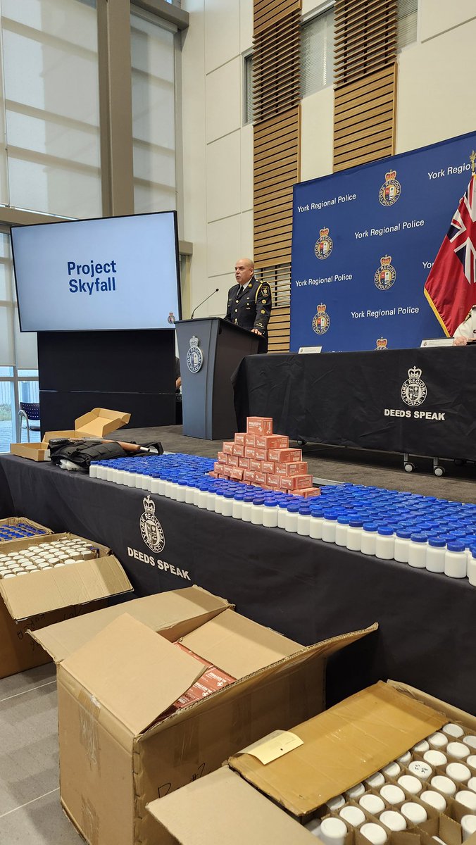 YRP's tweet photo. Happening now: Deputy Chief Almeida addressing Project Skyfall which disrupted on organized crime operation conducting home invasions and trafficking drugs across #YorkRegion 

#YRP #DeedsSpeak #ProjectSkyfall https://t.co/lMtKrMRm8d