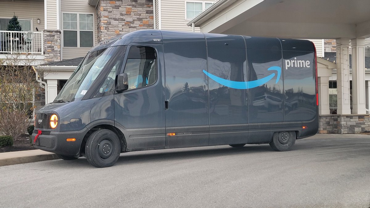 RandyBrown's tweet photo. I don't know about the rest of the country but this is the first electric Amazon delivery truck in I've spotted in Indiana. Still had its temporary license plate in place. https://t.co/GOyhiKS9C0