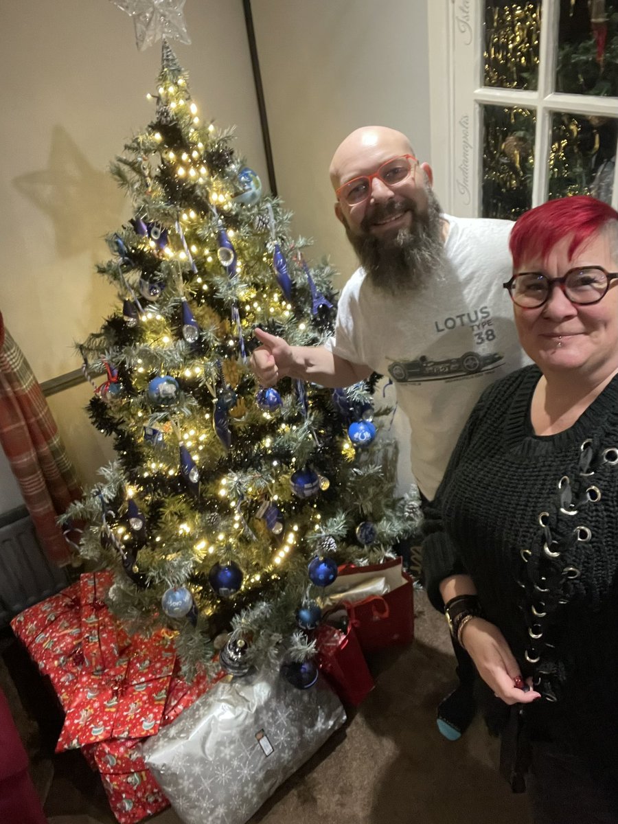 shepsan's tweet photo. @MarioAndretti Hi Mario, Barbie &amp; Giuseppe, Here’s the Grew “party of two”… me &amp; Clare @ClazzaGee here in Redditch UK. If you look very closely you might spot an Indiana bauble following our visit to Indy500 this year!
Wishing all the Andretti clan a Merry Christmas and a wonderful 2025 🏁🎄🌟 https://t.co/7ncxDA3Bgi