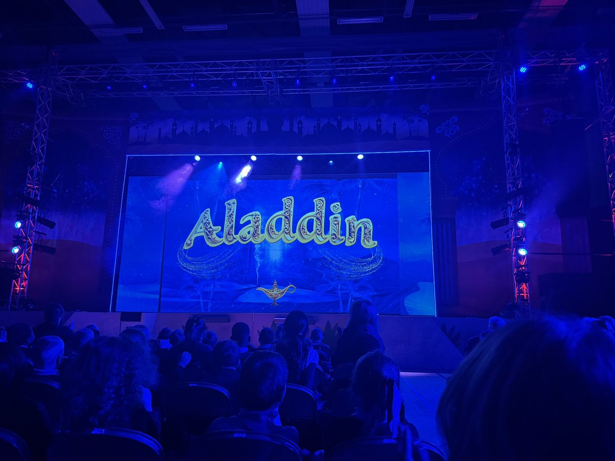 MrsClelland's tweet photo. Day 2 of Festive Week ๐โจ took us to the Ravenscraig Panto Aladdin!๐งโโ๏ธ๐ญ Oh yes we did! The kids were dancing, cheering, and booing the baddiesโa magical experience for everyone. ๐ Learning through laughter and fun! ๐ #FestiveWeek @BerryhillPN https://t.co/bmdXJFiWqQ