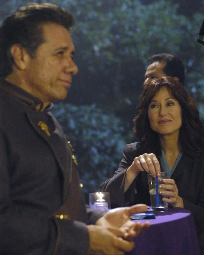 Commander William Adama and President Laura Roslin on Colonial Day. Edward James Olmos, Mary McDonnell. "Battlestar Galactica".