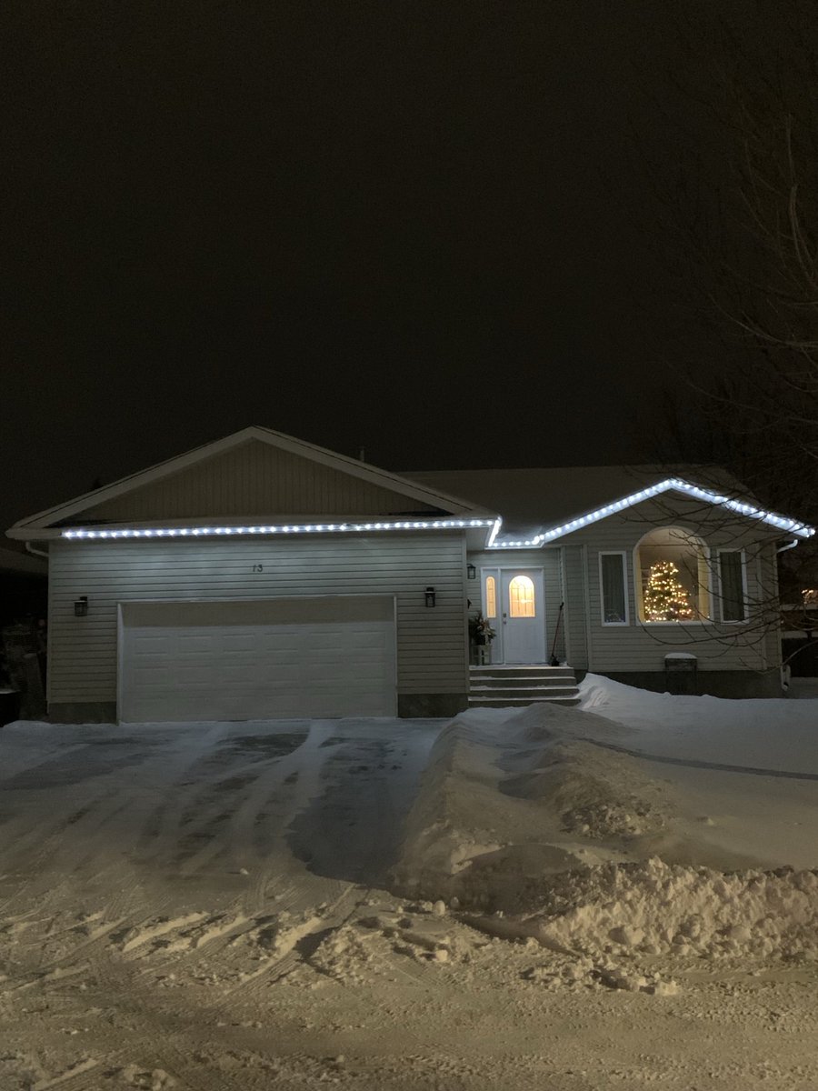Starting to feel a little more like Christmas. Lights up, Christmas tree up, snow on the ground