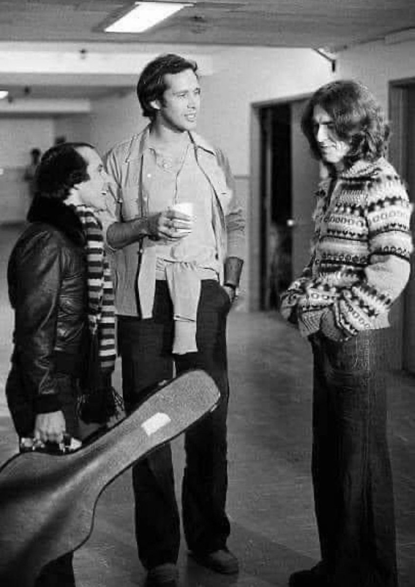 Great shot here of George Harrison, Paul Simon, and John Cocktoston.