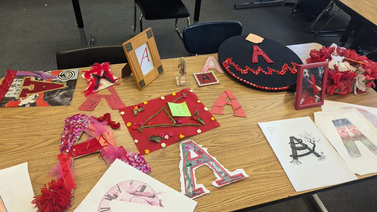 OPSCentralHigh's tweet photo. Students in Mrs. Porter’s AP Language and Composition class brought The Scarlet Letter to life today during a gallery walk!  Tasked with designing their own version of the iconic "A," each student created a unique interpretation to represent a key argument in the novel. https://t.co/WBVCAk2Itf