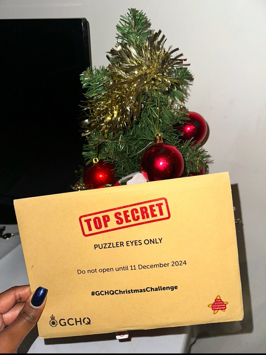 Came home to a golden envelope from <a href="/GCHQ/">GCHQ</a> .

What could possibly be inside it!