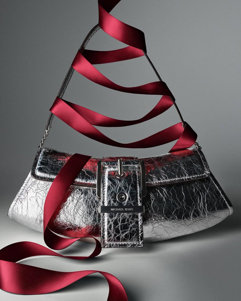 Jingle all the way...with Michaelkors metallic crackled leather Colby.

Photo Credits: @michaelkors