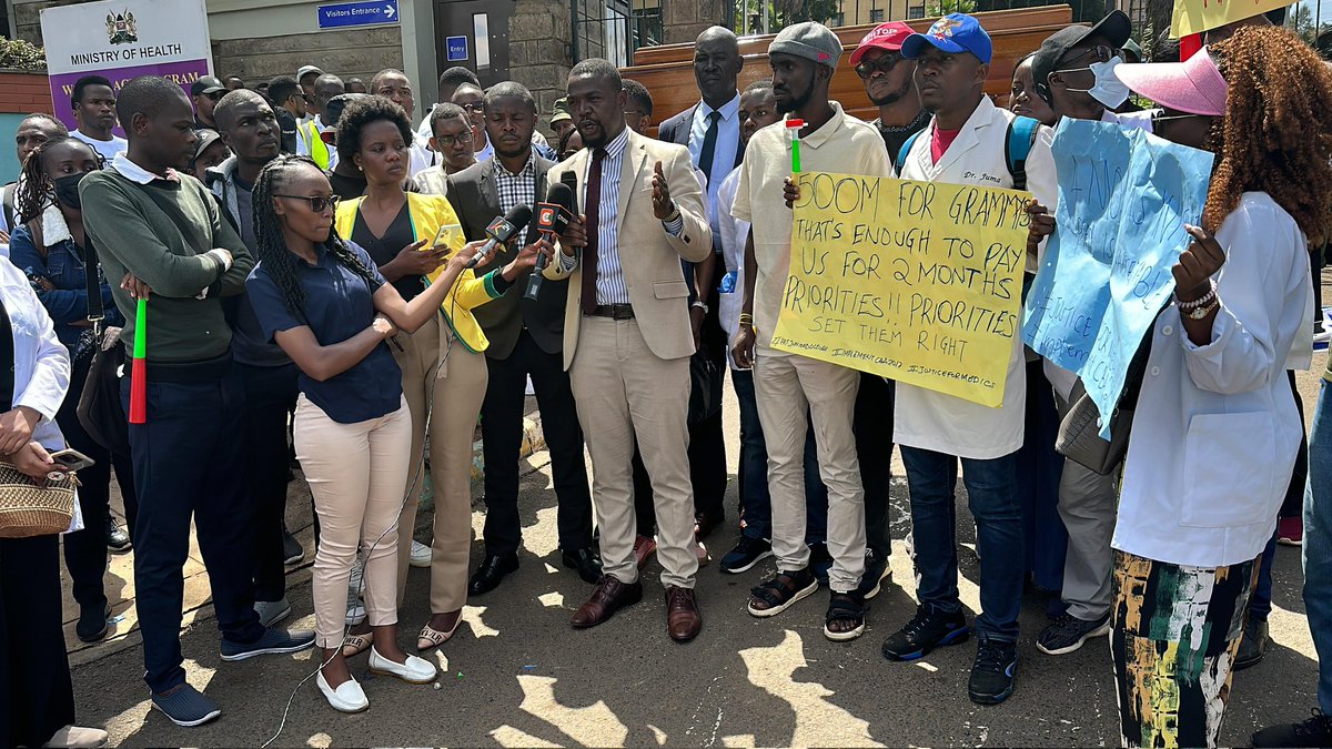 Davji's tweet photo. As @kmpdu, we stand in full solidarity with intern doctors who’ve been forced to work without pay since August. Their struggles and frustrations are a reflection of the government’s neglect of healthcare workers. The lies about universal healthcare must end! 

Today, intern doctors staged a massive protest at Afya House, marking their second demonstration over unpaid salaries. The CBA is clear—interns must be paid in full, nothing more, nothing less. The RTWF signed on May 8, 2024, must be implemented immediately.

On Monday, Dec 16 , we march from KNH to Nairobi Hospital, MoH & Parliament, to demand accountability.
If no action is taken by Dec 22, we will escalate to a nationwide doctors’ strike.

This fight is for the dignity of the medical profession and the future of healthcare in Kenya. Stand with us!