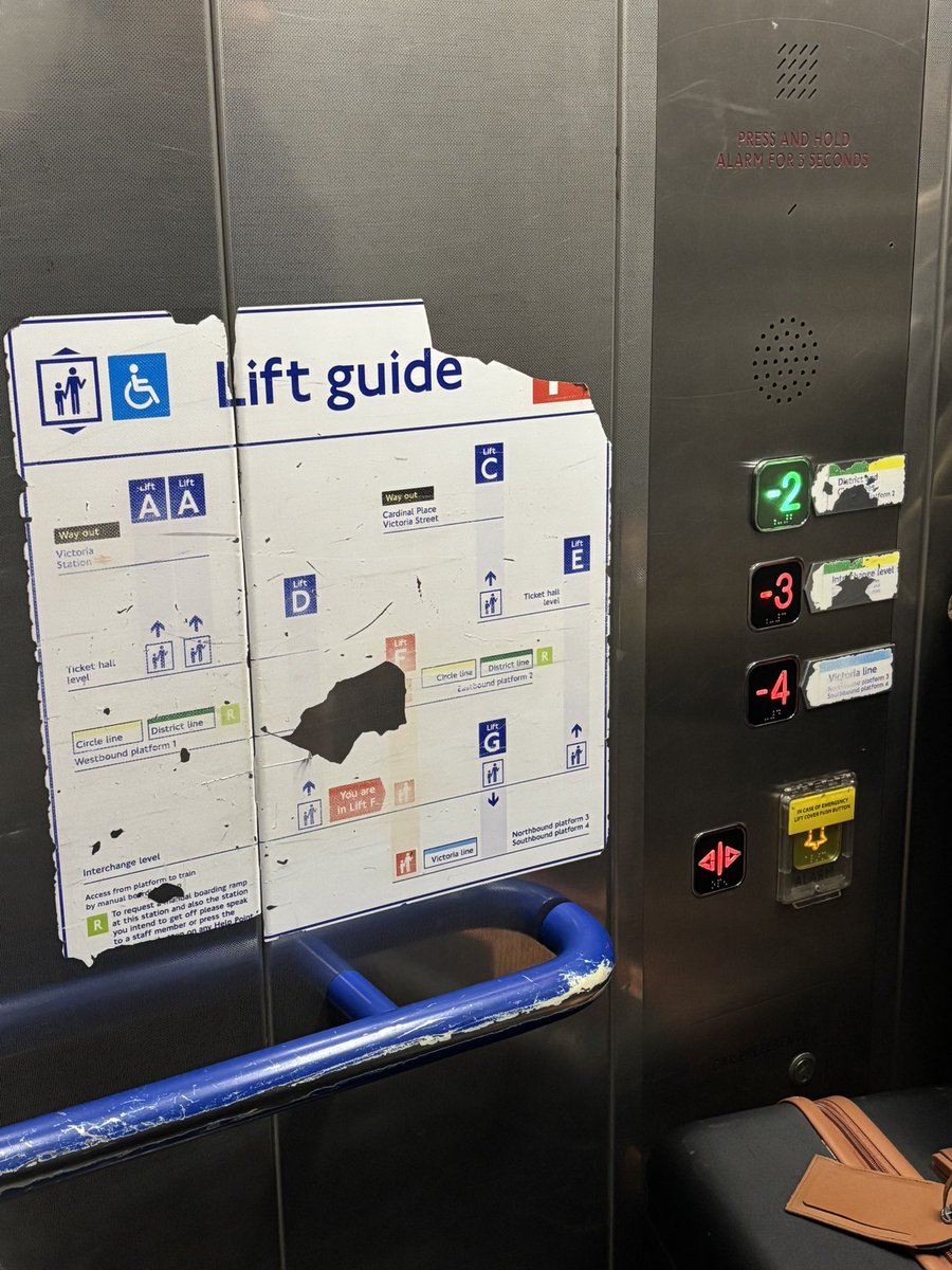 Your signage in a lift in Victoria Station <a href="/TfL/">TfL</a> I’m a native, but imagine if you didn’t know the city or had additional access needs?!? 

The system is not accessible as it is…but look at the state of this. Surely an easy fix?