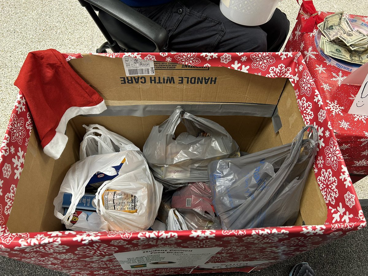 Thank you so much to everyone who made a donation and took pictures with Santa at last night's basketball game! We received many items to be donated to the High School Food Bank and raised $73! 

Santa will be back next Friday night at 5:30! Donations accepted through 12/20.