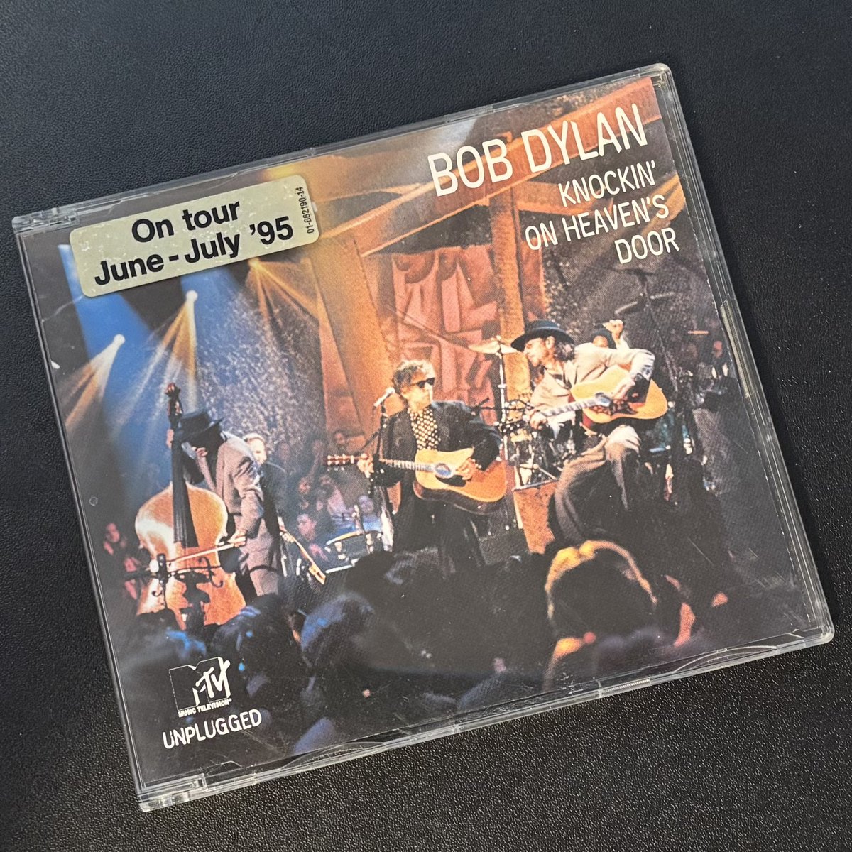 One of the most interesting parts of <a href="/bobdylan/">Bob Dylan</a>’s ‘95 Unplugged is when he and the band switch over to play “Knockin’ On Heaven’s Door” left-handed. (This is one of my favorite Unplugged rarities in my collection: a European import single with reversed/misprint cover art).