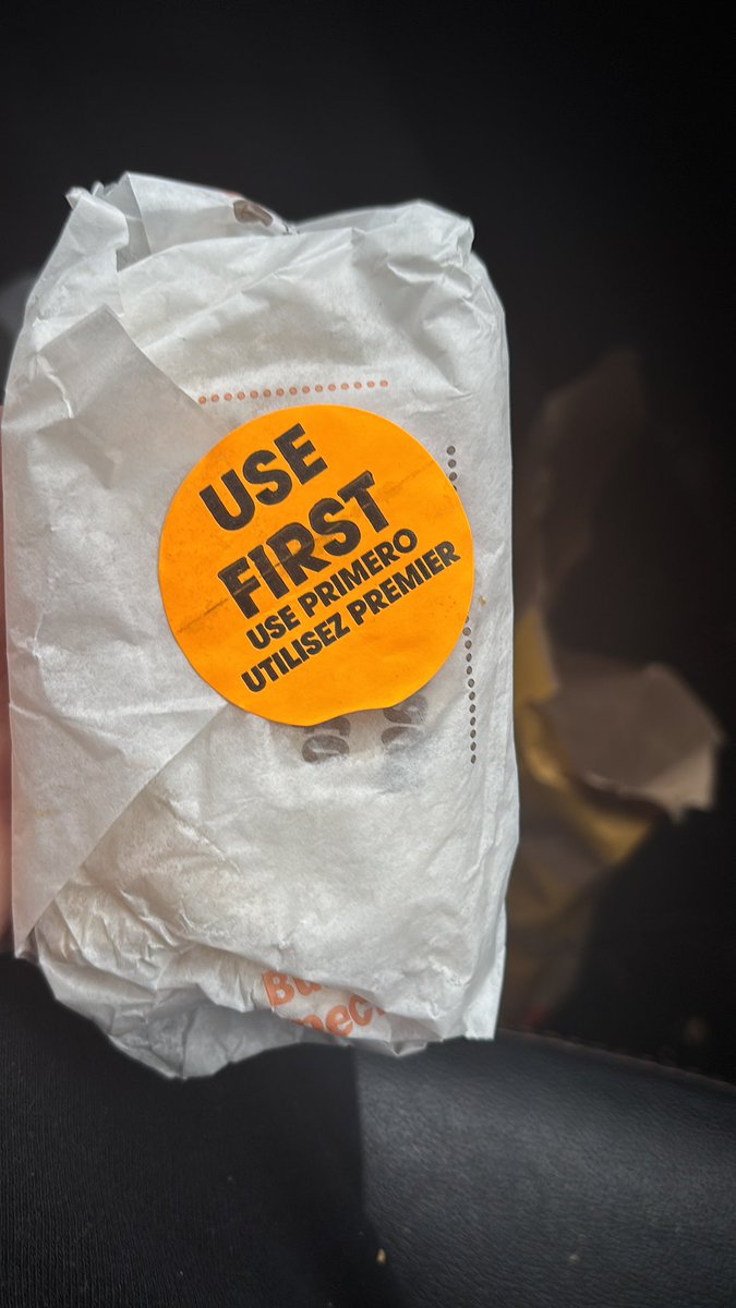 TraveIG's tweet photo. @McDonalds @McDonaldsCorp using use first stickers to close a burrito is a very interesting move. Also burrito is flat as a pancake🤔. This is why I stick with @dunkindonuts https://t.co/CODrUagctY