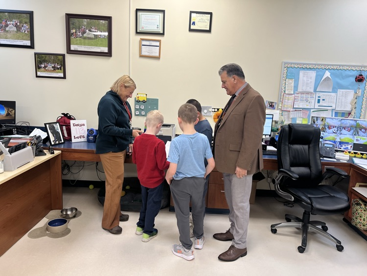 Ranger and Fort Barton Principals and students coming together to do the Pledge of Allegiance. Coming together for the greater good.