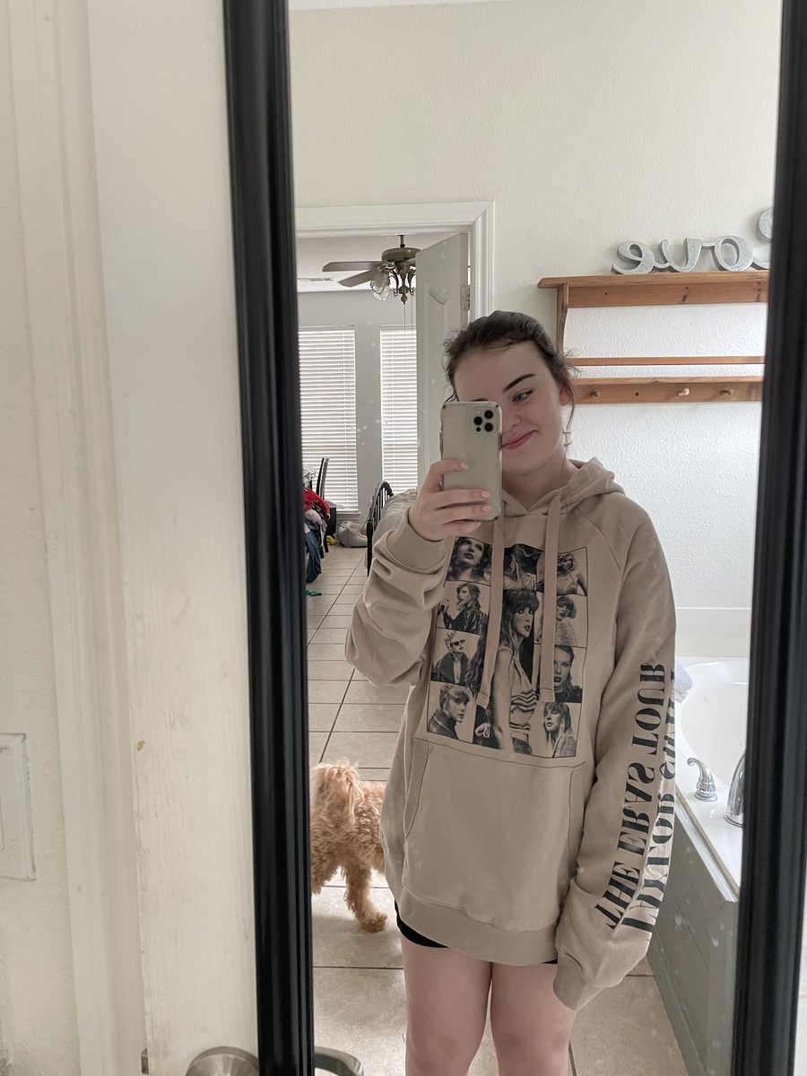__theantihero__'s tweet photo. @taylornation13 can confirm this hoodie is a tayESSENTIAL 🤭🤍 #TSTheErasTourCollection https://t.co/D56OB7D8C4