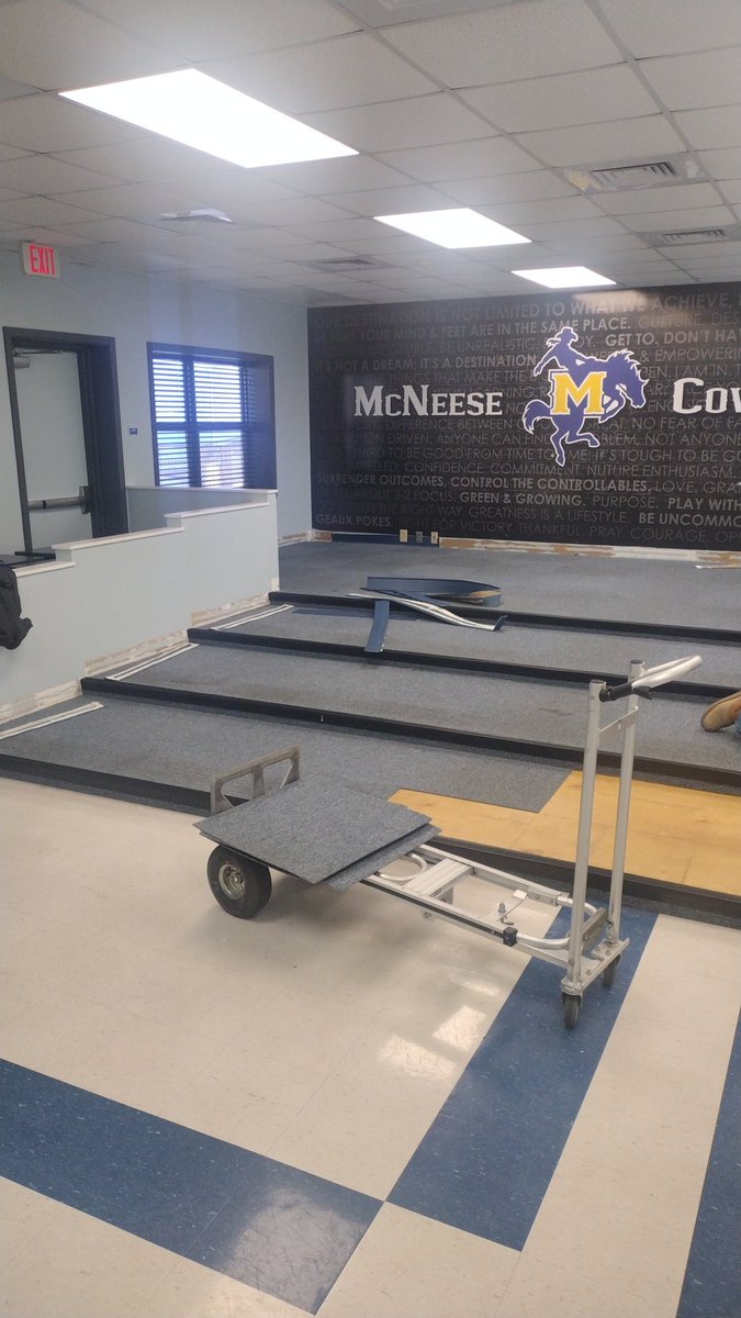 A little holiday renovation going on in our film room!  Phase 1 is flooring, baseboards, paint, etc.  Phase 2 (coming spring 2025) is new, upgraded theater seating,
