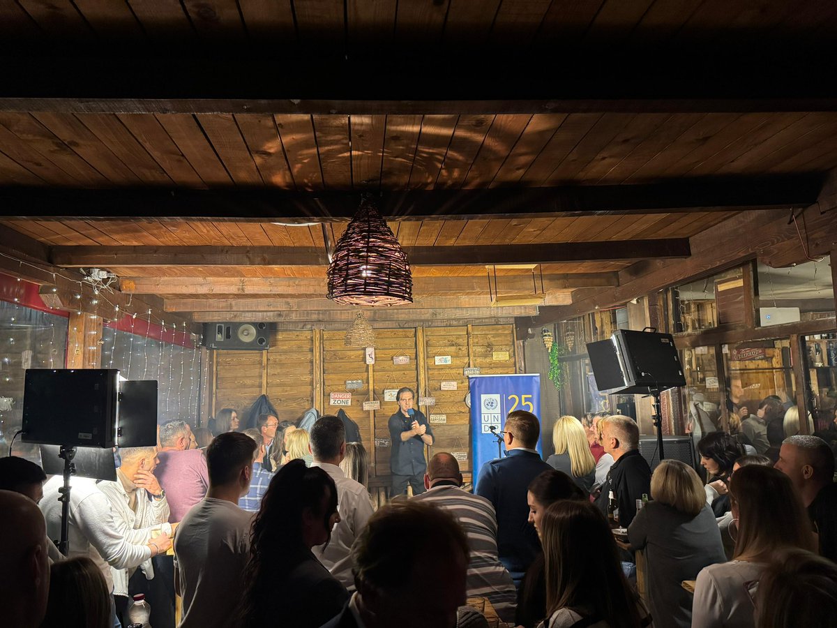 UNDP_Kosovo's tweet photo. Last night, #16DaysOfActivism broke boundaries with a creative approach —STAND-UP Comedy! 🎭 Ivan took the stage, using humor to tackle the serious issue of gender-based violence with respect and intention. A night to laugh, reflect, and amplify the call for change. 🧡 #EndGBV https://t.co/YsWKqXWZ2k