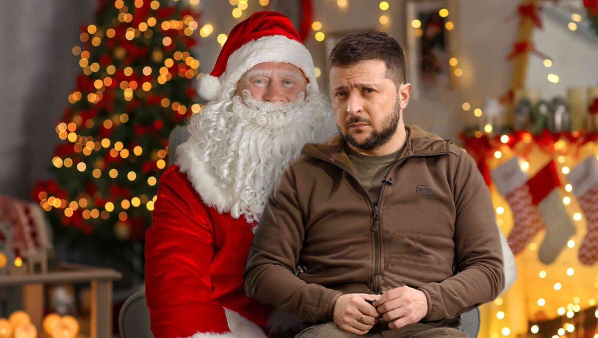 TheBabylonBee's tweet photo. Zelensky Seen Sitting On Mall Santa’s Lap Asking For Another $50 Billion https://t.co/oztrovYuYl https://t.co/WzURAhm26a