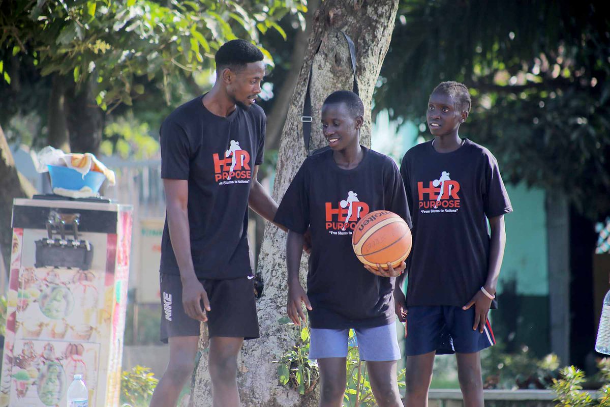 slumstonations's tweet photo. Such an amazing moment seeing Mr. Uganda join our girls on the court during his visit to #HERPURPOSE Basketball Camp! 🏀 His presence was truly inspiring, and the interaction with him left a lasting impact on our campers. #HerPurpose #Inspiration #BasketballForChange https://t.co/PsMI25UbEB