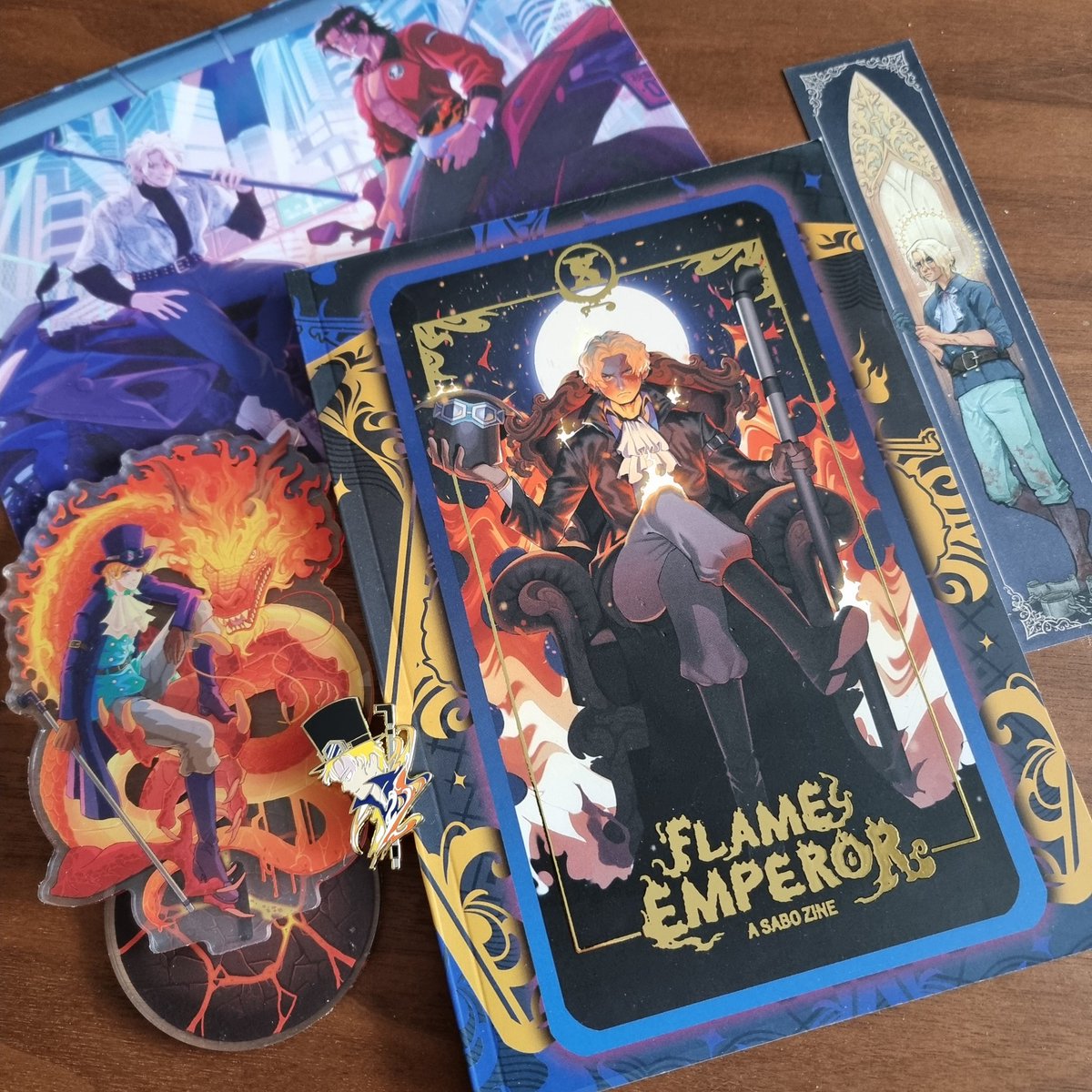 It was such a privilege to work on <a href="/SaboZine/">Flame Emperor: a Sabo zine</a> with so many amazing artists! Leftover sales started so go get your copy!

#Sabo #onepiece #zine #standee #enamelpin #fanbook #sabofanart