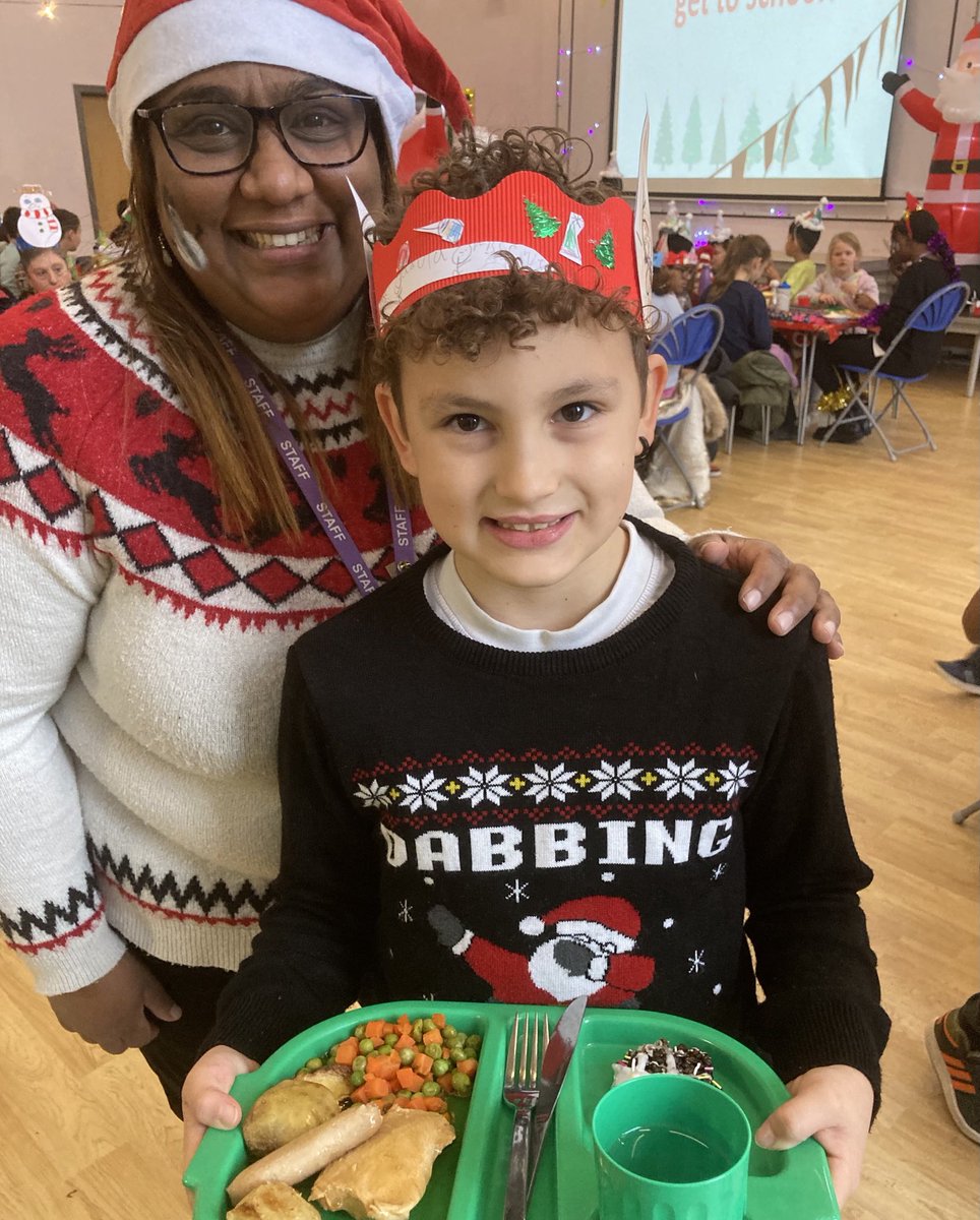 Enjoying Christmas Lunch together at school today.