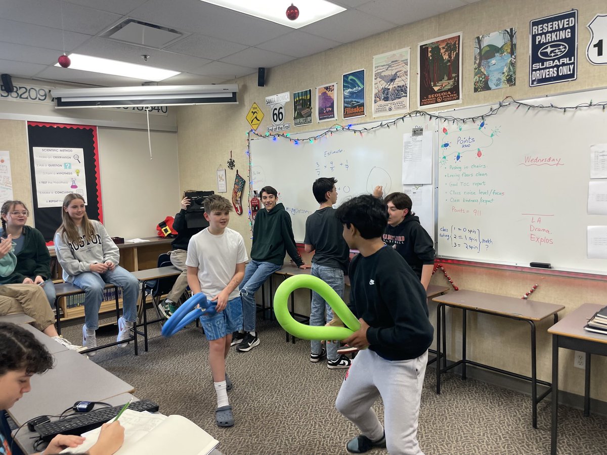 mtd1969's tweet photo. Similar to the sport of chess boxing, students made a boxing ring with desks. There were 3 rounds with 2 minutes of math and 30 seconds of noodle combat per round. Spectators vote on the winner based on questions correct and best body blows. #meimiddle #makingmathfun https://t.co/LIVWL3ufFS