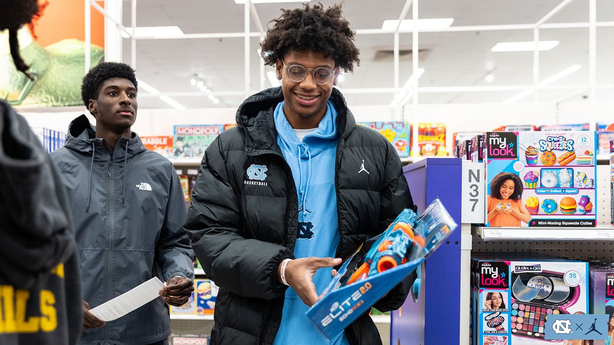 UNC_Basketball's tweet image. Checking off the kids’ wish lists 🎁🩵