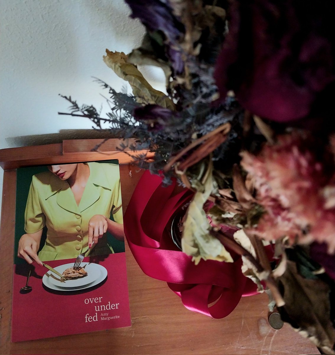 goosebath's tweet image. advance copy of over under fed! all held and smelled!! i am so happy. you can pre-order your copy through the AUP website (link in my bio). 💃♥️