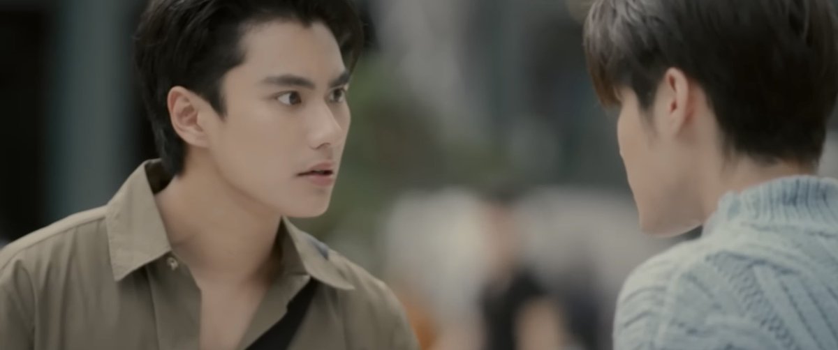 lengtnpz's tweet photo. "The third can of coffee and the energy drink made Min feel a bit more awake after practicing his lines all night long.

“Hey! You! Stop for a second. I'm not the problem here you know?”

Min mumbled his lines as he entered Anda Tower, an office building that was the casting venue. Min pulled out the script that was rolled up in his pants pocket, reading it intently with his head down, not watching where he was going, and bumped into someone.

"Sorry," Min quickly looked up at the person he had bumped into, and that person was Q, who was too busy with his coffee cup to watch where he was going.

“It's okay,” Q smiled.

Min inadvertently glanced Q, feeling his heart flutter because this person was exactly his type, a perfect 100, with no points to deduct. Min found himself thinking that if he lived another life and met someone who ticked all his boxes like this, he wouldn't let them just walk by so easily. But this was Min...a man with creditors holding knives to his throat before bed, with only twelve thousand baht left in his account, and a younger brother with a heart condition to take care of.

Min thought that even if he met someone he liked this much, a temple dog like him could only look. Min slowly memorised the details of that face: an oval-shaped face, fair and bright skin, a high nose, sharp features with a slightly sweet look, beautiful teeth, and moles scattered untidily on his face, making everything even more captivating. There was an added bonus of a dimple too. The more details he collected, the more feelings of regret overwhelmed him. He could only tell himself to look enough and then let go because he could only remember that face, knowing that such an ideal person truly exists in the world." -Kidnap ลับ-จ้าง-รัก Chapter 1, when Min first meets Q.