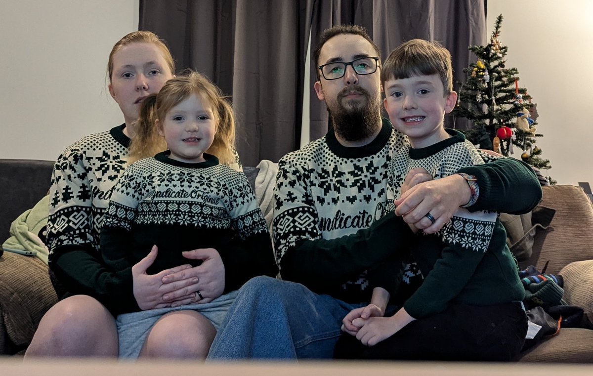 EllieLouT's tweet photo. Been a while since we've gotten a family photo. Xmas jumpers from @SyndicateOG @Syndicate babies are happy and proud to be repping 💙💜 #ChristmasJumperDay https://t.co/C1RWtQquZr