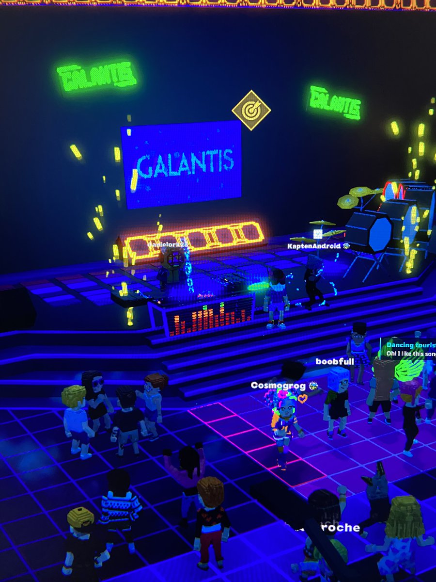Winne752's tweet photo. Rocking out at the @wearegalantis Stage in @TheSandboxGame. The virtual crowd is going wild! 🎉🔊 https://t.co/b9pwxa4mLD #TheSandbox #AlphaSeason4 #AS4SocialChallenge https://t.co/EzB7LmuWEw