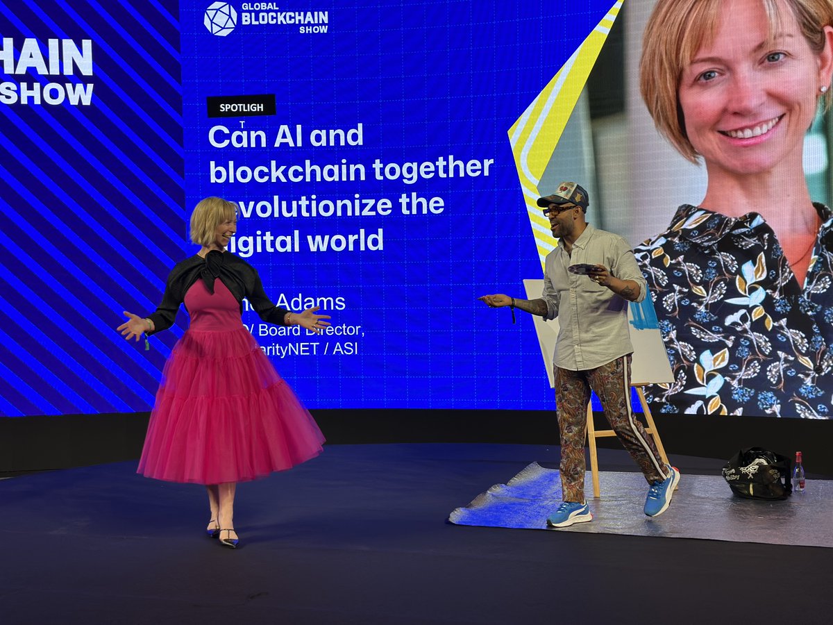 SingularityNET's tweet photo. Can AI and Blockchain Together Revolutionize the Digital World?

Our COO, @JanetAdamsAI, took the stage today at the Global Blockchain Show @0xGBS in Dubai alongside Robin Reyes, Founder of Heal Through Art, to discuss the combined values of AI and blockchain and how these frontier technologies can work in synergy to address global development priorities and create new possibilities for humanity.

Janet began with an assessment of contemporary AI, specifically highlighting the challenges of big tech domination and addressing the industry's focus on LLMs. Despite their capabilities, these models demonstrate significant constraints: they are very closed-ended systems tied to their training data, poor at original multi-step logical reasoning, and incapable of radical creativity.

As Janet mapped out a path toward beneficial AGI, Reyes' artwork emerged in the background, offering an artistic counterpoint to the discussion of technological advancement. Where current systems are pre-trained on large data sets and respond only as programmed or prompted, AGI systems will reason and learn from experience with strategic thinking and decision-making. While current AI remains limited to its original scope and struggles in complex dynamic environments, AGI will adaptively work with nuance and complexity.

The technical core of Janet’s keynote focused on the philosophy behind and the components of the OpenCog Hyperon framework for open-ended, beneficial AGI development. Hyperon serves as the infrastructure for the PRIMUS Hybrid Cognitive Architecture, integrating metagraph meta-representation, deep neural nets, logical reasoning, and evolutionary learning. Through this system, different cognitive processes — from perception hierarchies to language comprehension — work together within the Distributed Atomspace, enabling collaboration between specialized algorithms. This cognitive synergy, Janet explained, extends beyond basic AI capabilities to support applications ranging from robotics and biological reasoning to financial prediction and mathematical logic.

In this line, Janet presented the @ASI_Alliance as an alternative path to AGI development, backed by our groundbreaking $53 million investment to create the world's first supercomputer dedicated to decentralized AGI. The initiative demonstrates our commitment to energy-efficient and sustainable hardware infrastructure, with recent acquisitions including Nvidia L40S GPUs, AMD Instinct and Genoa processors, Tenstorrent Wormhole server racks, and servers with H200 GPUs and Nvidia GB200 systems.

The Alliance's approach emphasizes open-ended cognitive architecture, open source code, diverse heterogeneous AGI algorithms, and ethically sourced and managed data, all supported by decentralized infrastructure and governance. This supercomputer infrastructure is specifically optimized for deep neural networks, large language models including multimodal variations, and hybrid neural-symbolic computing architectures like OpenCog Hyperon, to enable AGI continuous learning, supporting high-load scenarios for large-scale AI operations, and advancing decentralized AGI research.

Another focus was on blockchain technology as a foundational element for AGI development. Janet detailed how blockchain enables decentralized, performant, and defensible compute infrastructure for AI while providing a crucial framework for resource-constrained distributed computing that mirrors biological neural systems. The technology, she explained, ensures protection against attacks and bad actors in decentralized AI systems while facilitating a secure exchange of compute resources and valuable data for advanced AI training. She further elaborated on blockchain's scalability benefits, describing how it offers a scalable solution for high-volume data processing and AI computations while supporting hardware-agnostic performance scaling through efficient utilization of increased physical threads.

Beyond the technical aspects, Janet highlighted two significant social impact initiatives bridging technology and human development. The DigiTruck Ethiopia program led by Betelhem Dessie represents an ambitious educational outreach, aiming to train over 27,000 students, with more than 16,000 being female participants. The initiative provides fundamental programming and robotics training to underprivileged youth aged 8 to 18, utilizing an off-grid mobile digital lab to reach marginalized areas. The program expands digital literacy nationwide through project-based learning approaches while significantly increasing female participation in technology and computer programming.

Parallel to this, Janet highlighted the Healing Through Art initiative, which combines traditional creative expression with cutting-edge technology education. Led by Robin Reyes, the program offers an inclusive space for all ages and abilities, incorporating diverse art forms from Pop Art to pottery alongside modern elements like Web3, Meta, and AI Learning. The initiative has demonstrated an 81% positive impact on participants' mental health through artistic expression while empowering students through financial literacy and entrepreneurship education. Reyes's tailored classes provide a unique blend of creative and practical skills, scientifically proven to reduce stress, anxiety, and depression while preparing participants for future opportunities.

Through the DigiTruck Ethiopia program and Healing Through Art, real change is already happening in communities that need it most. Those interested in supporting these transformative programs can visit https://t.co/rL7dIeY8MB or https://t.co/8S2Me8daNL. Every contribution helps expand the reach of these programs, bringing technology education and creative empowerment to more communities worldwide.