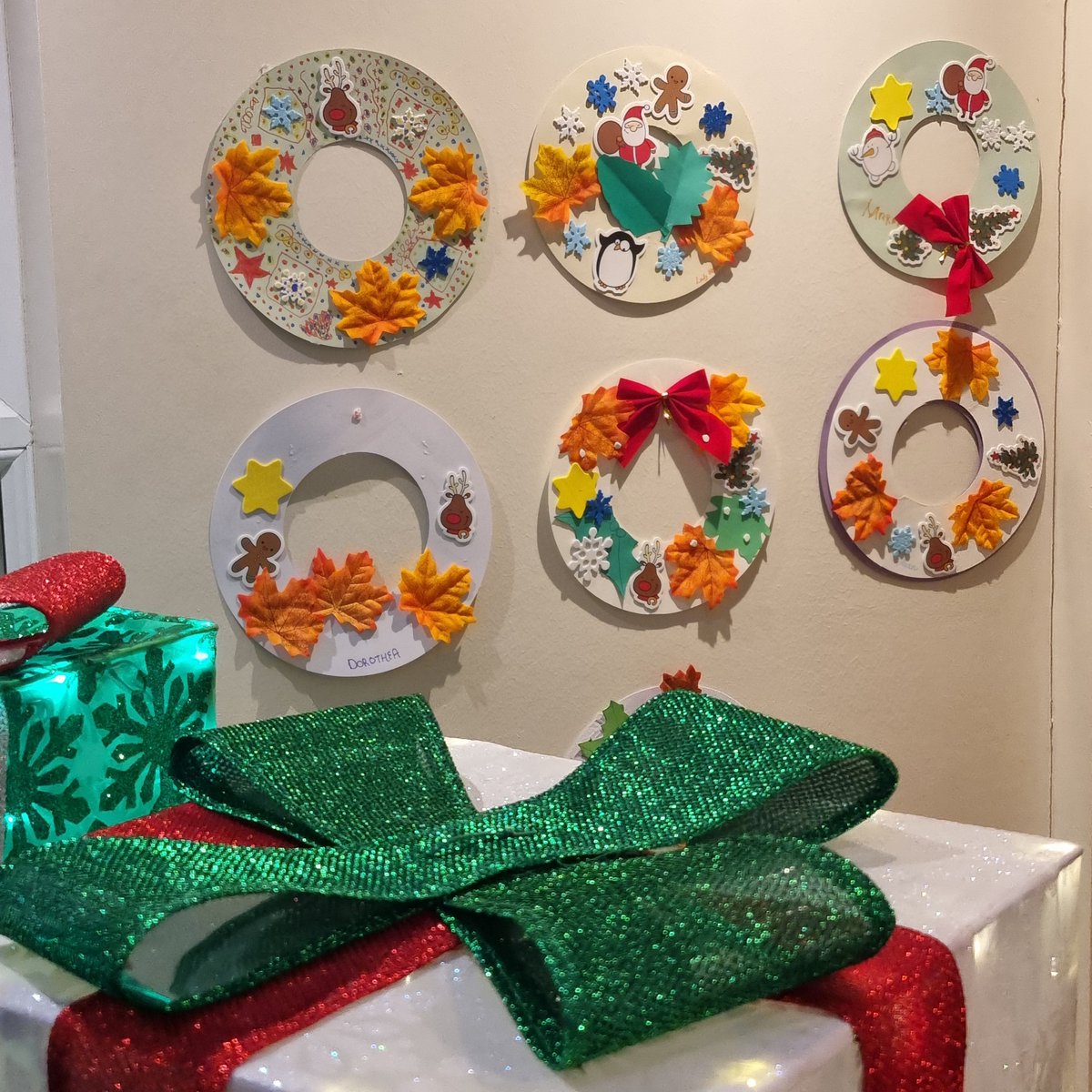 Look at these amazing Christmas wreaths our participants made on a recent workshop. If you'd like  to get creative yourself why not make your own Christmas card this afternoon? We'll even take them to the post box for you! bit.ly/3OCHXPb #ChristmasCard #CreativeArts